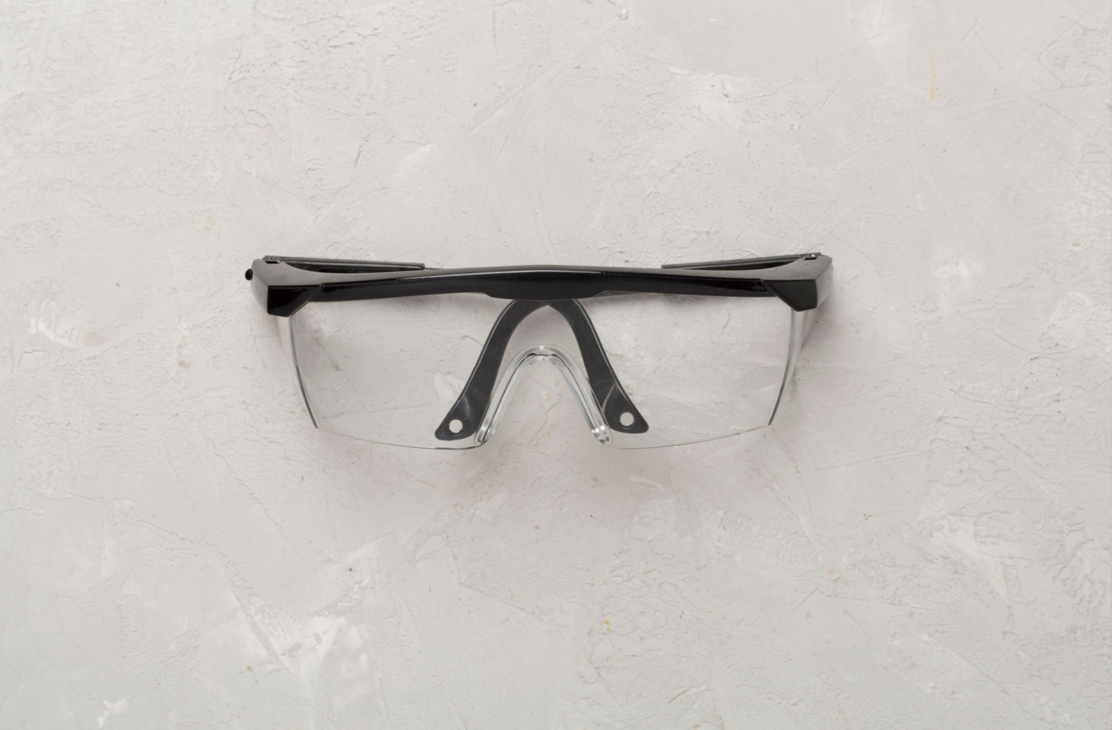 Prescription safety glasses are on a white background.